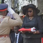 Military honors Raila Odinga with flag presentation to Mama Ida