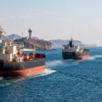 Tanker, container ship hit as Iran shuts Strait of Hormuz again