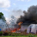 Angry crowd sets Ebola hospital tents on fire in DR Congo
