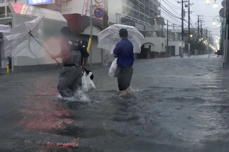 Typhoon Dujuan leaves two dead as Japan orders mass evacuations