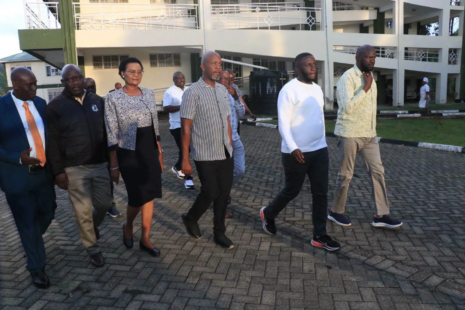 Luanda MP Dickson Maungu (center) leads the National Assembly’s Public Investments Committee on Governance and Education during a site visit to inspect the stalled Sh209 million classroom complex at Sigalagala National Polytechnic.