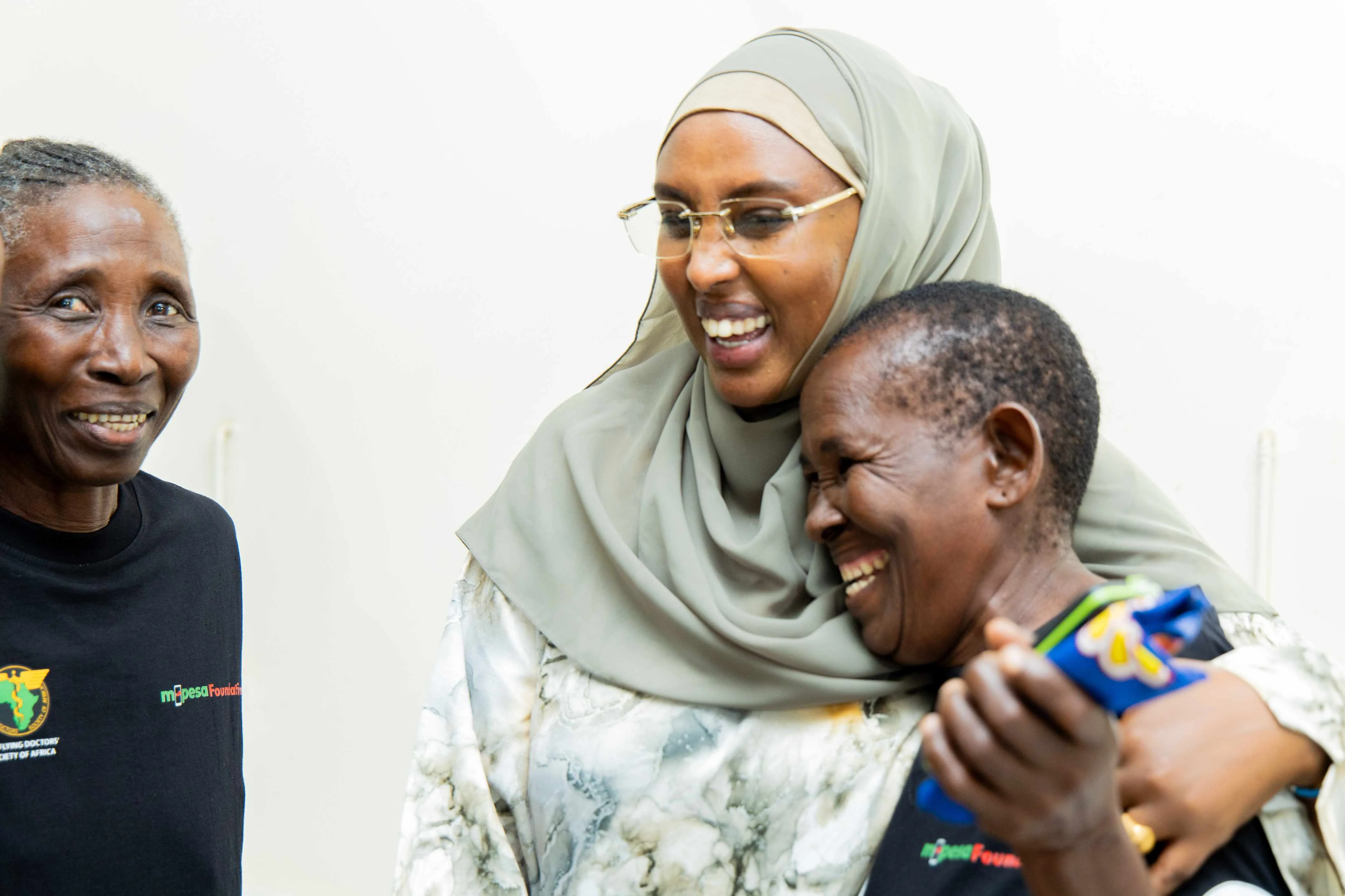Marsabit County First Lady and Chairperson of the County First Ladies Association, Alamitu Guyo, shares a heartfelt moment with Rehema Katete after she successfully underwent fistula surgery at Marafa Sub-County Hospital.