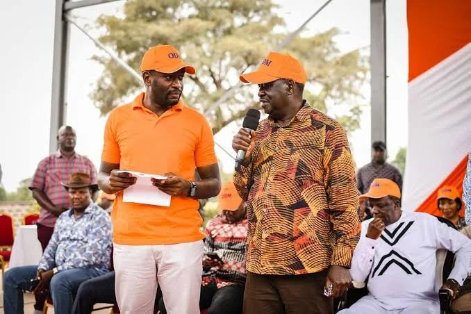 The late Raila Odinga and Nairobi Senator Edwin Sifuna.
