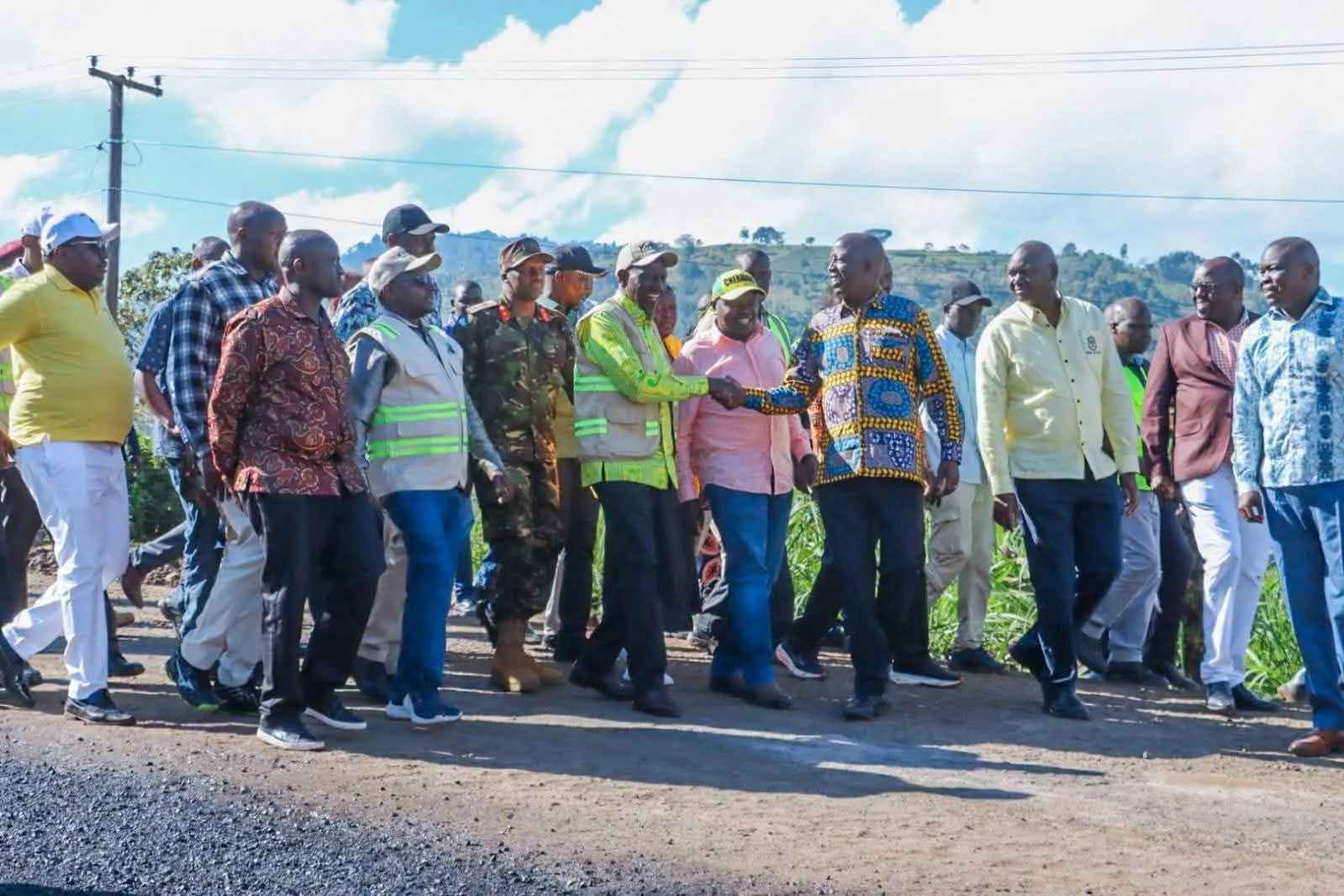 President William Ruto (C) joins leaders in Nandi County during a development tour of the area.