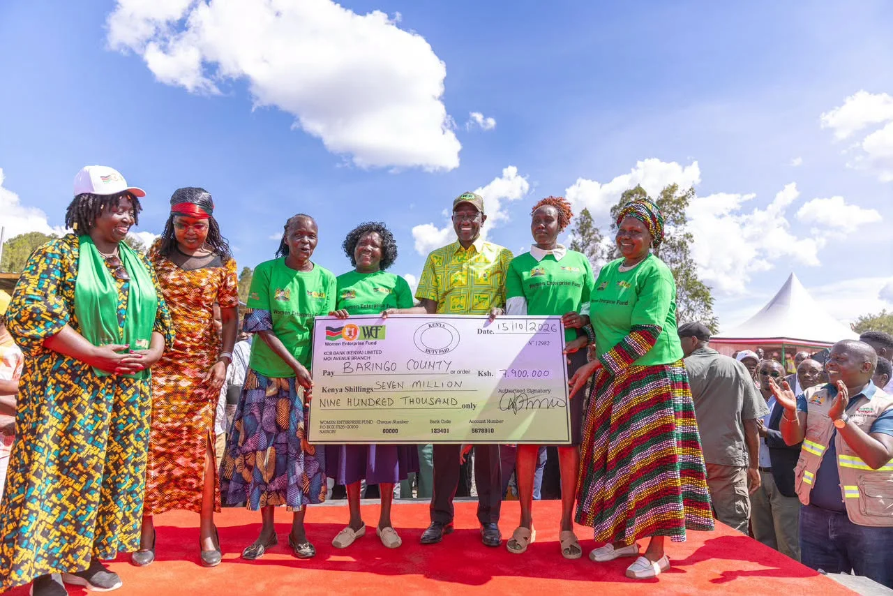 President William Ruto issues a Women Enterprise Fund cheque to beneficiary groups in Baringo County in Kabarnet, Baringo Central Constituency, on October 15, 2026