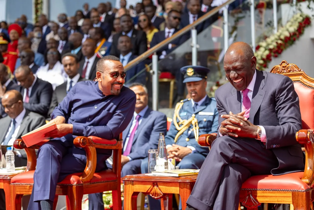 Ethiopian Prime Minister Abiy Ahmed and President William Ruto share a moment of laughter at Kipchoge Keino Stadium in Eldoret, Uasin Gishu County on October 20, 2026