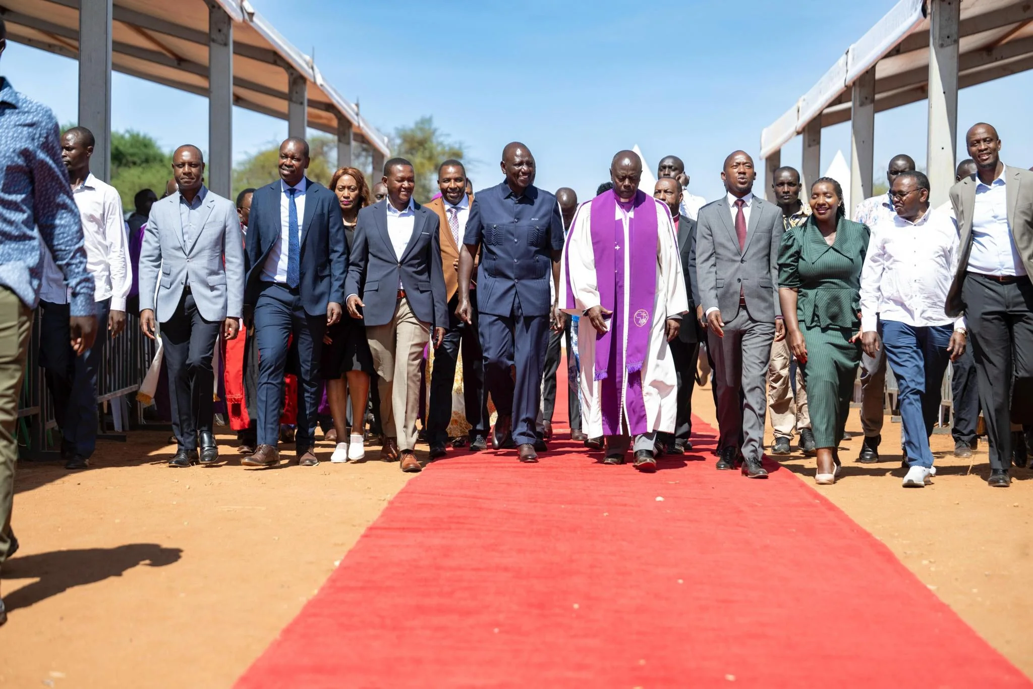 President William Ruto, accompanied by other government leaders, arrives at the Africa Inland Church (AIC) Kasina in Mwingi Constituency, Kitui County on October 25, 2026