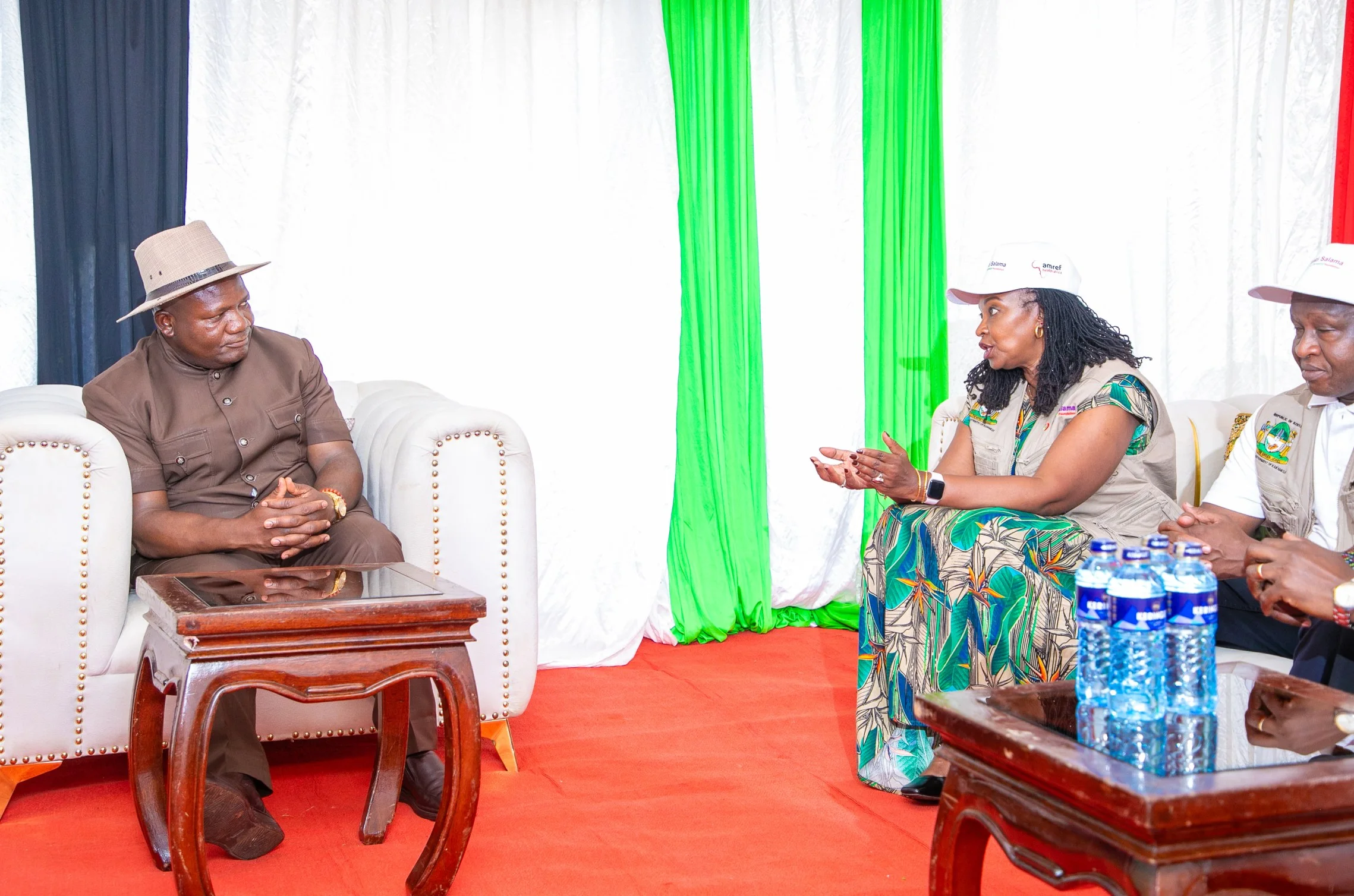 M-Pesa Foundation Trustee Patricia Ithau engages Kakamega Governor Fernandes Barasa before the groundbreaking of a new maternity wing at Navakholo Sub-County Hospital, marking the launch of the Uzazi Salama programme in Kakamega County.