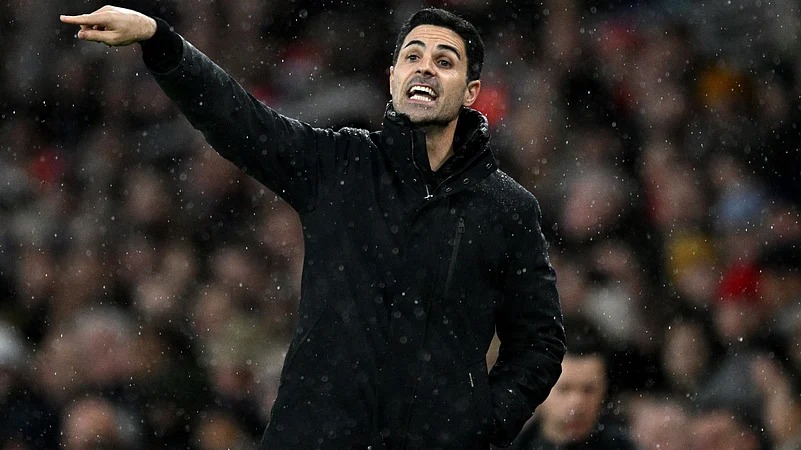 Arteta cools title fever with calm realism