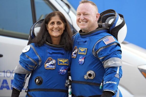 Nasa astronauts back on earth after nine-months in space