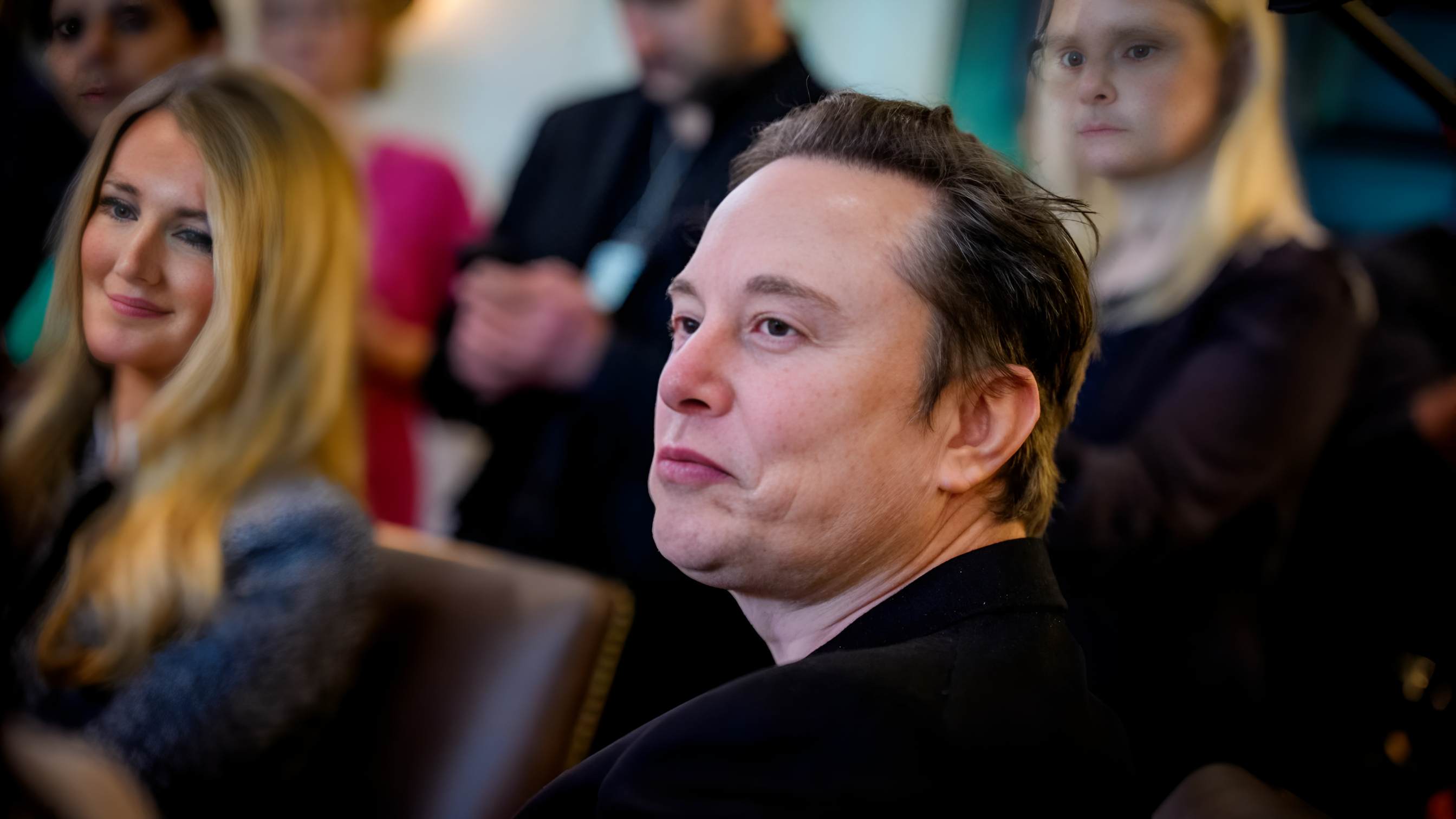 Tesla profits slide as costs rise and AI spending grows